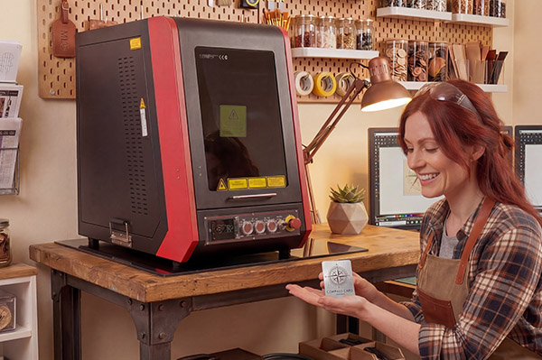 An image of the HPC desktop fibre laser engraver in use for arts & crafts