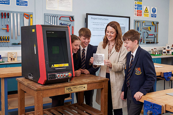 An image of the HPC fibre laser engraver in a classroom